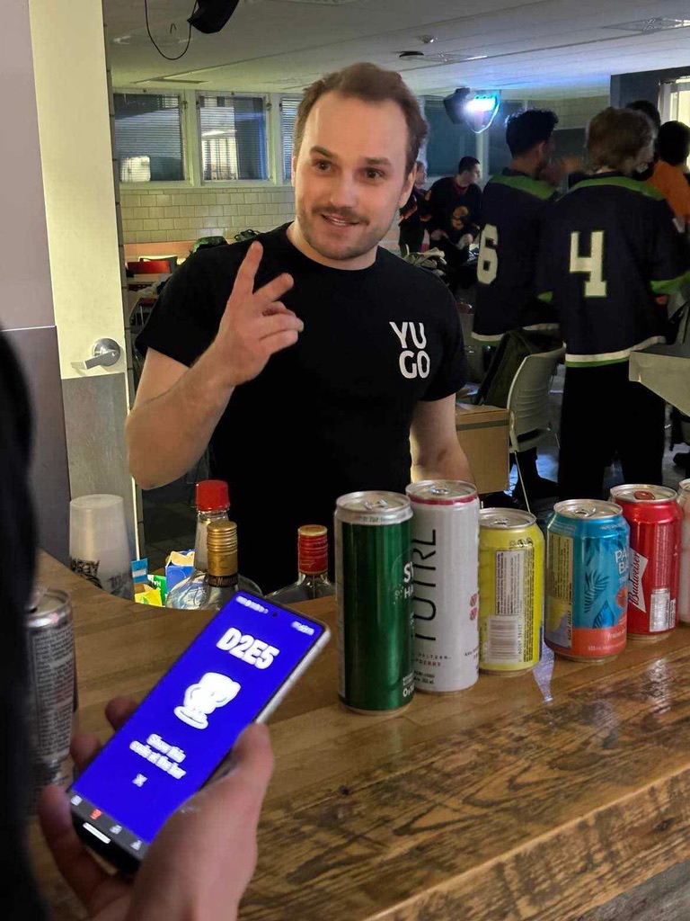 Yugo's CEO behind the bar taking orders